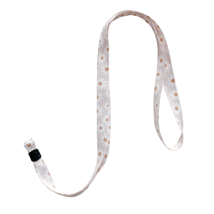 Coconut Lane Daisy Chain lanyard with daisy pattern and black adjustable buckle.