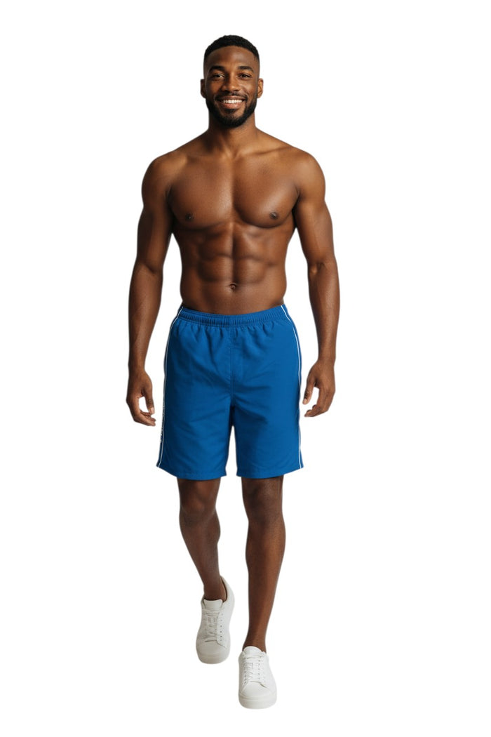 The Lifeguard Store blue polyester-spandex boardshorts with white piping and GUARD logo. Elastic waistband, drawstring, and side pocket.