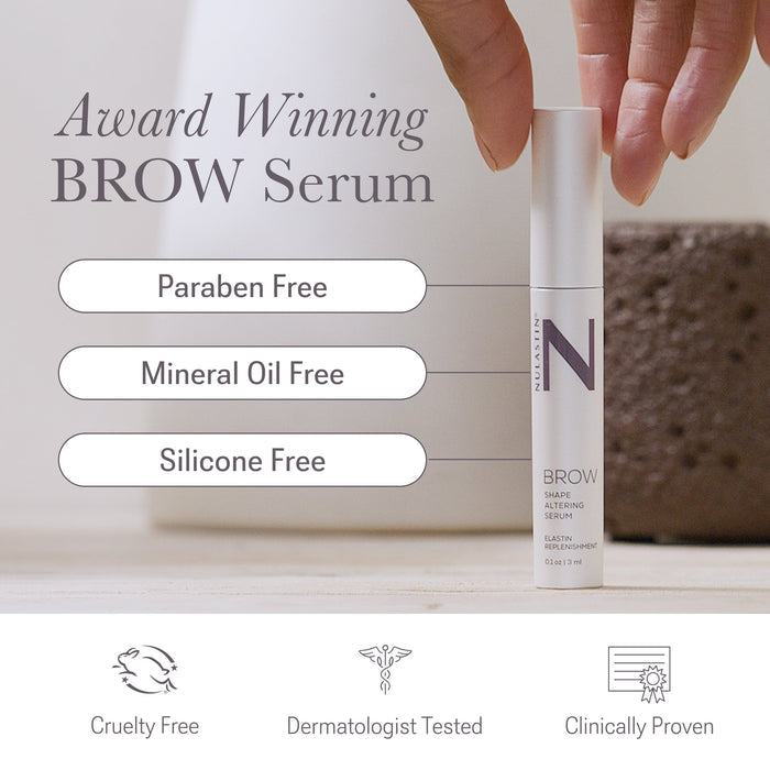 Angled view of Allure x BROW Shape Altering Serum tube showcasing angled brush applicator on light gray background
