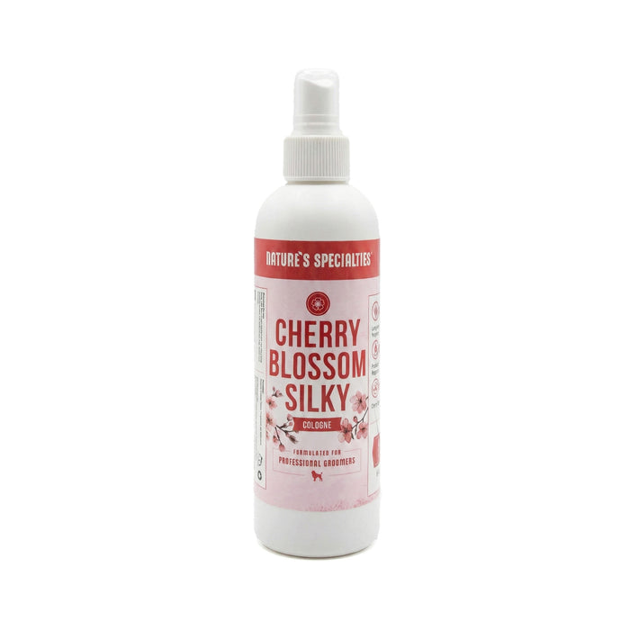 Bottle of Cherry Blossom Silky cologne on a white background