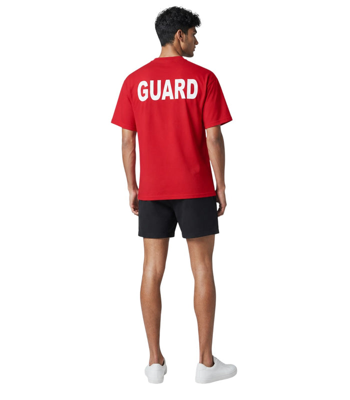 The Lifeguard Store red Dri-Fit short sleeve tee with large white GUARD text on the back worn by a male model