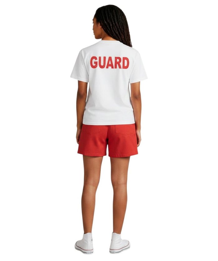 The Lifeguard Store white short sleeve t-shirt with large red GUARD text on the back worn by a woman