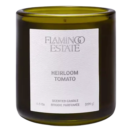 Scented candle labeled 'Flamingo Estate Heirloom Tomato' on a white background