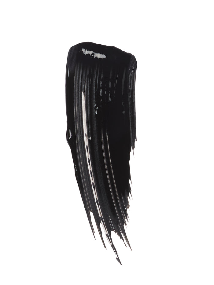 A bold black mascara swatch with glossy finish and textured streaks.