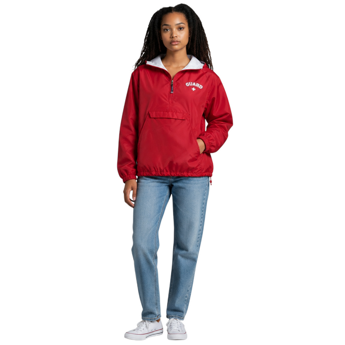 The Lifeguard Store red nylon pullover jacket with Guard logo, front pocket, and ash heather lining on a model.
