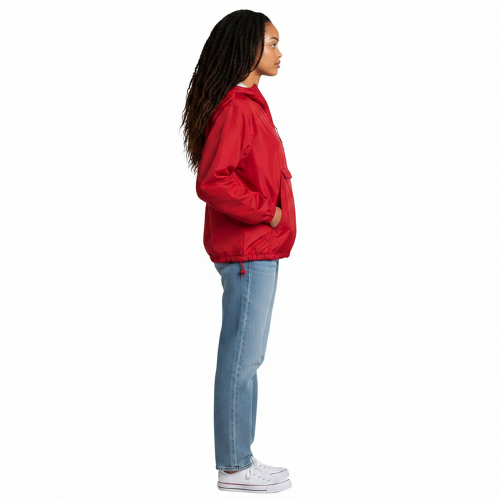 A model wearing a red The Lifeguard Store pullover jacket with a front pocket, side view against a white background.