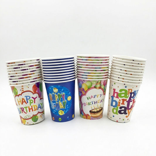 Set of colorful paper cups with 'Happy Birthday' text on a white background