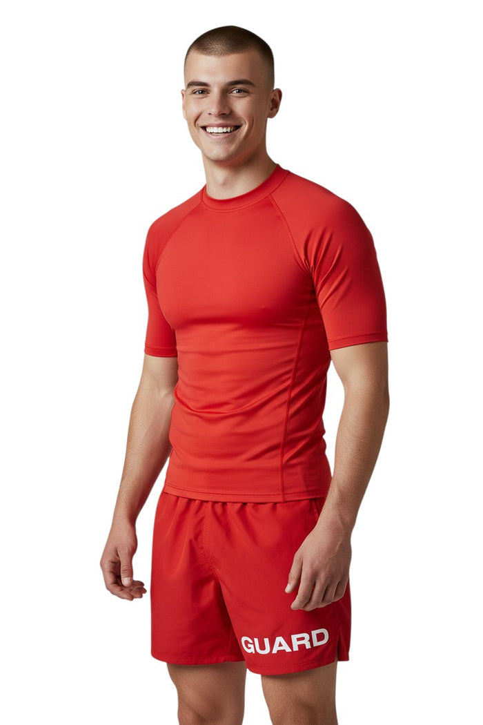 The Lifeguard Store red 4-way stretch polyester lifeguard deck shorts with "GUARD" printed on the left leg.