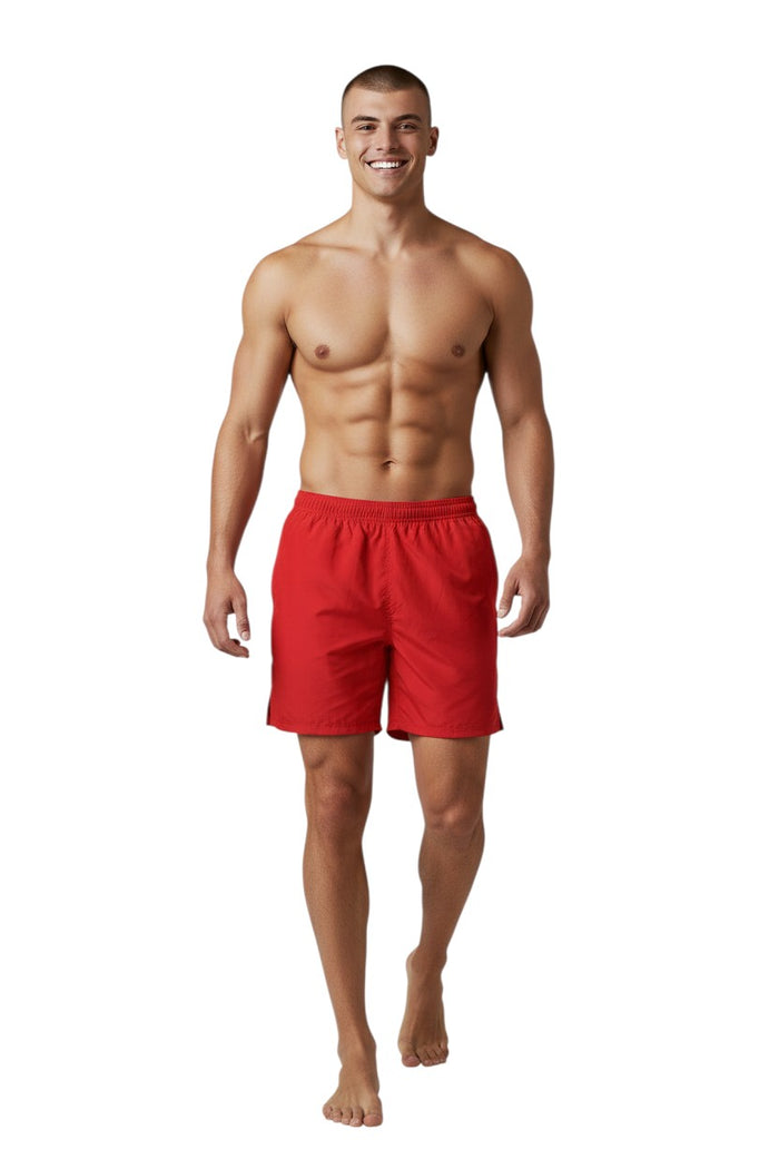 The Lifeguard Store Kiefer 4-Way Unisex Deck Short in solid red. Features elastic waist, drawstring, side pockets, and a back velcro pocket.