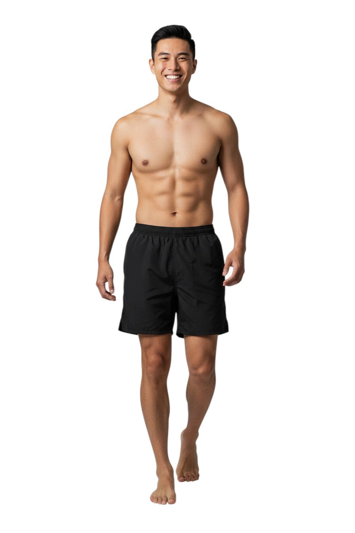 The Lifeguard Store Kiefer 4-Way Unisex Deck Short in black, featuring an elastic waist, drawstring, side pockets, and a back velcro pocket.