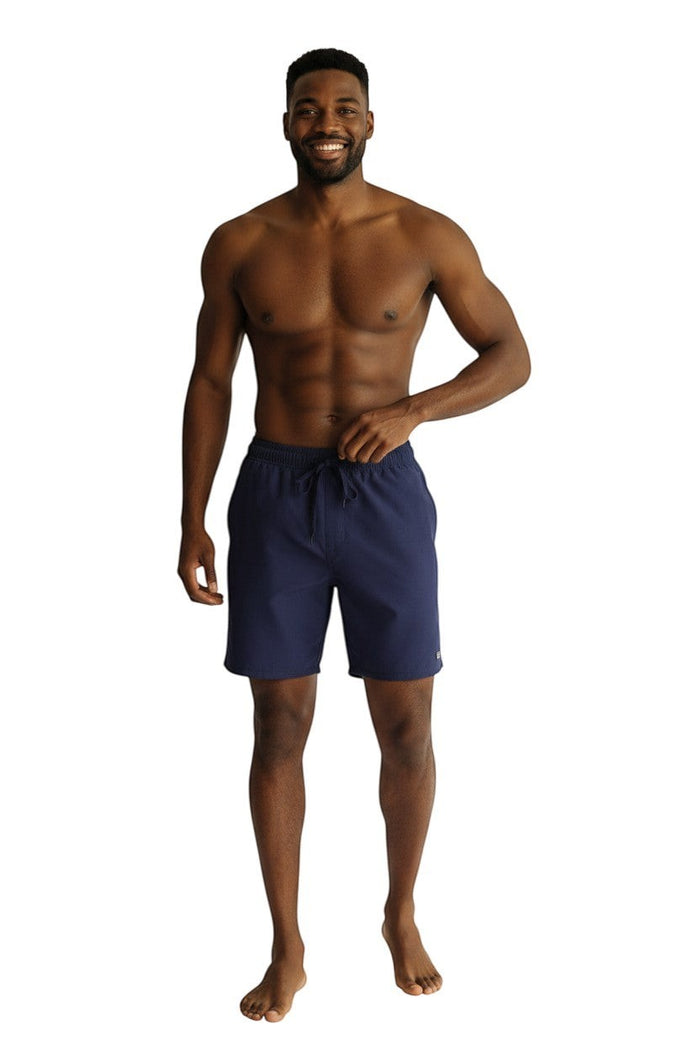 The Lifeguard Store navy blue men's 5" swim shorts with elastic waistband, drawstring, and side pockets. Quick-dry, 4-way stretch fabric.