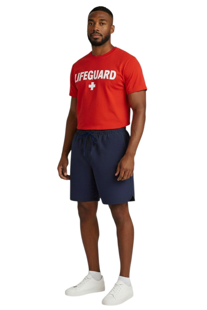 The Lifeguard Store Men's navy blue 5" swim shorts with drawstring and side pockets. Quick-dry, 4-way stretch fabric with UPF50+ protection.