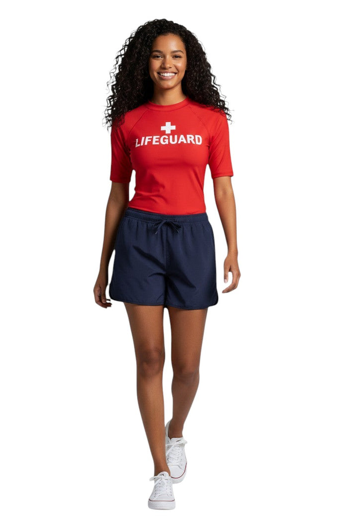 The Lifeguard Store Kiefer Women’s 5” navy blue quick-dry stretch shorts with drawstring and side pockets.