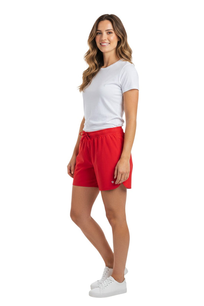 The Lifeguard Store red 5" Guard shorts with elastic waistband, drawstring, and side pockets. Quick-dry, 4-way stretch fabric with UPF50+ protection.