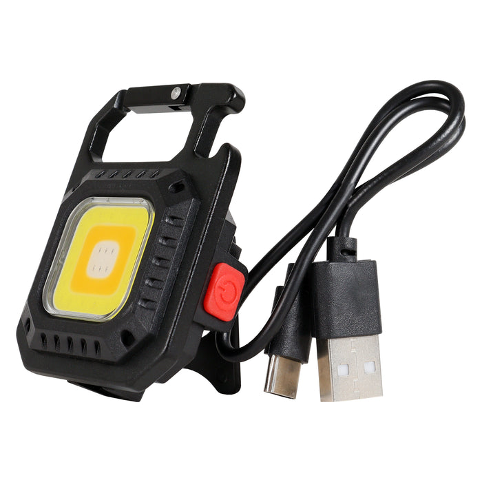 Black portable work light with USB cable on a white background