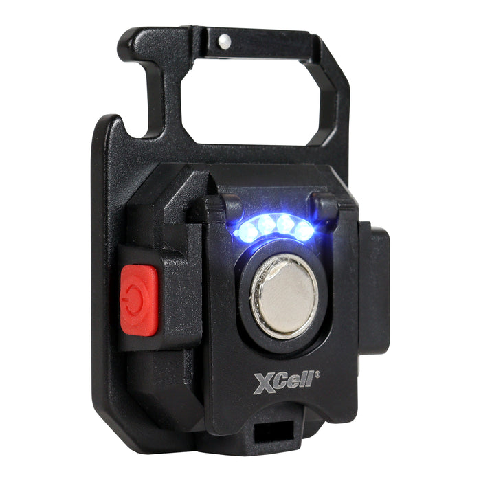 Black XCell personal safety device with a red button on a white background