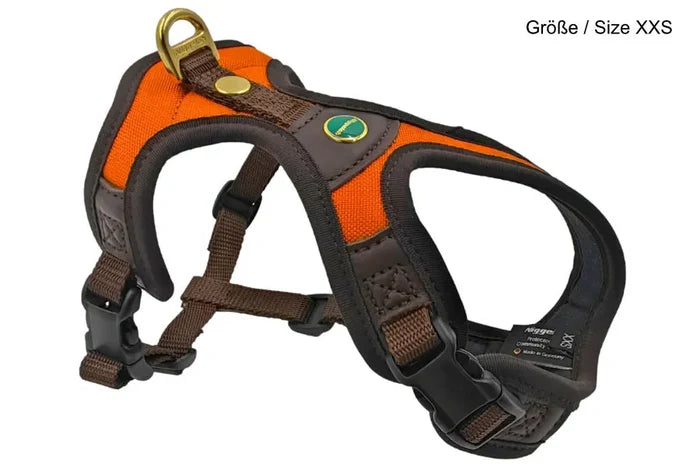 Dog harness with orange and brown design on a white background