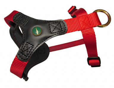 An red and black Niggeloh Follow Start Harness for dogs, featuring quick release snaps and an adjustable belly strap.