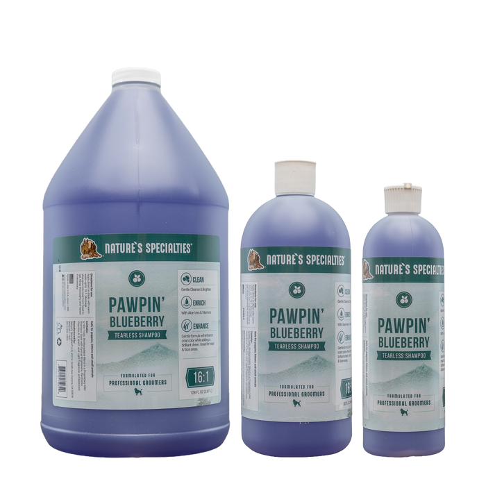 Three various-sized bottles of Nature's Specialties Pawpin' Blueberry Tearless pet Shampoo.