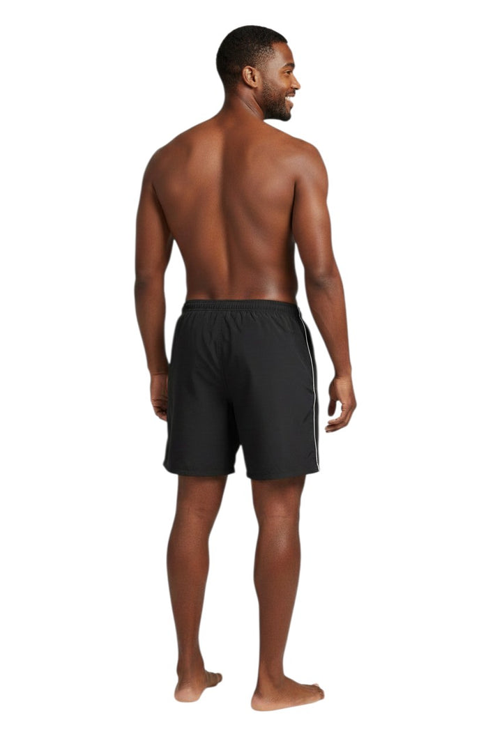 The Lifeguard Store black nylon guard trunk with 5" inseam, elastic waistband, side pockets, and Guard logo on left leg.