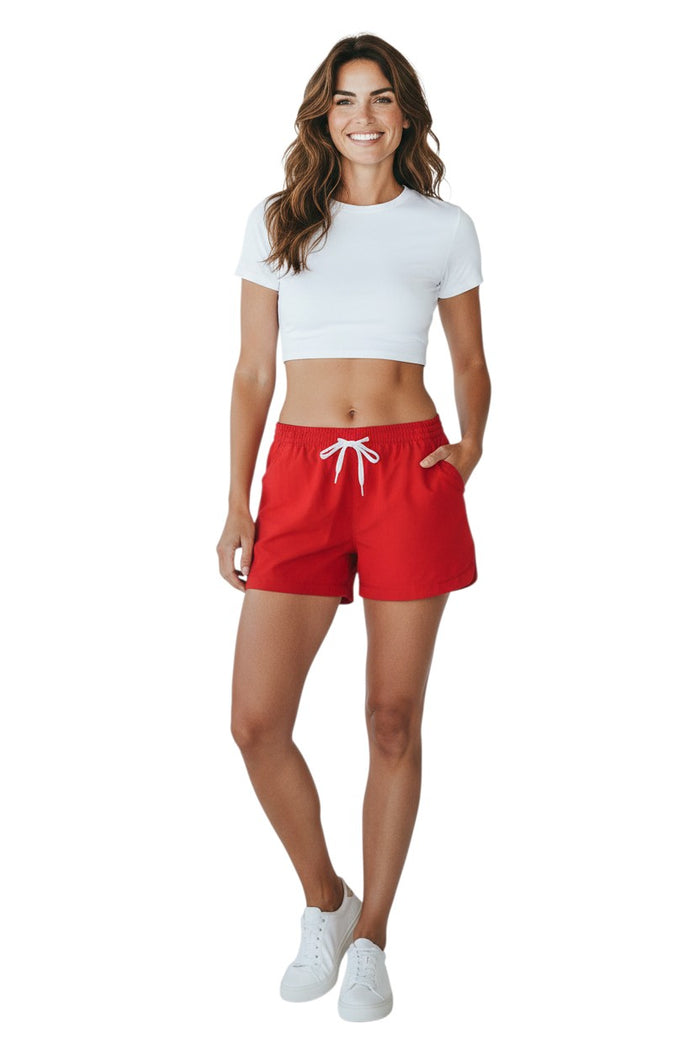 The Lifeguard Store red polyester comfy shorts with elastic waistband, drawstring, and pockets. UPF30+ UV protection.