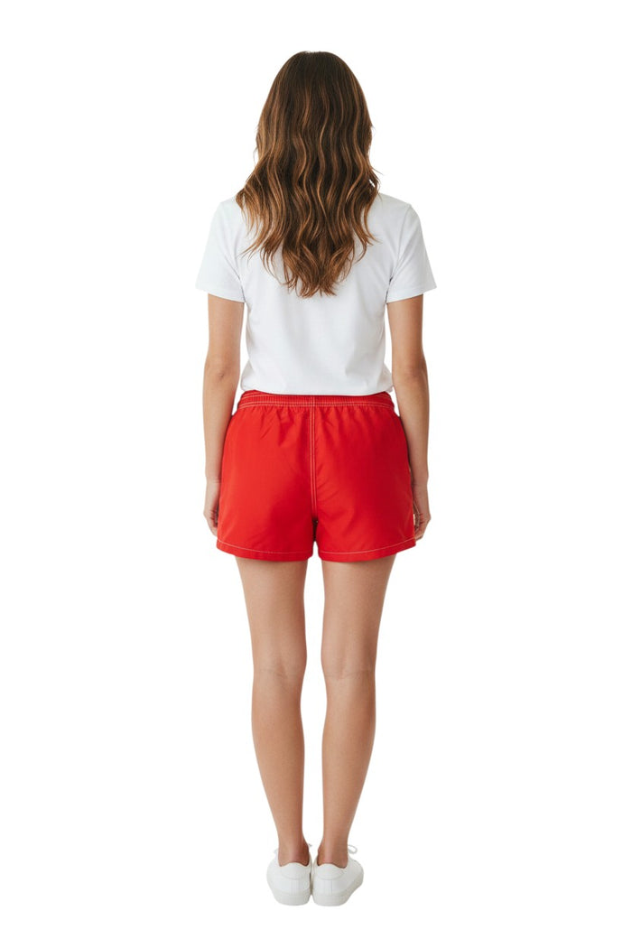The Lifeguard Store red nylon board shorts with 3" inseam, elastic waistband, drawstring, and side pocket.
