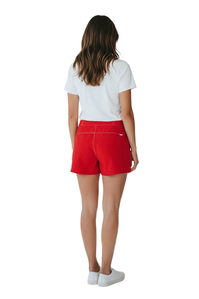The Lifeguard Store red polyester-spandex Guard Flex shorts with drawstring waist and side pocket. Guard logo on left leg.
