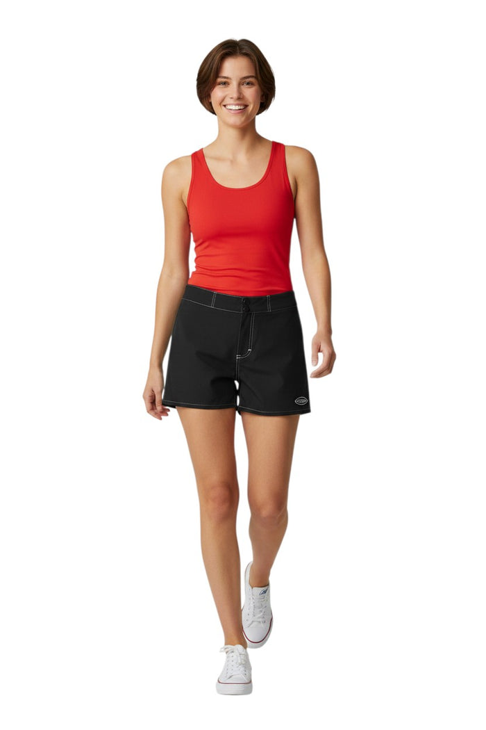 The Lifeguard Store black polyester-spandex blend Guard Flex shorts with drawstring waist and side pocket. Guard logo on left leg.