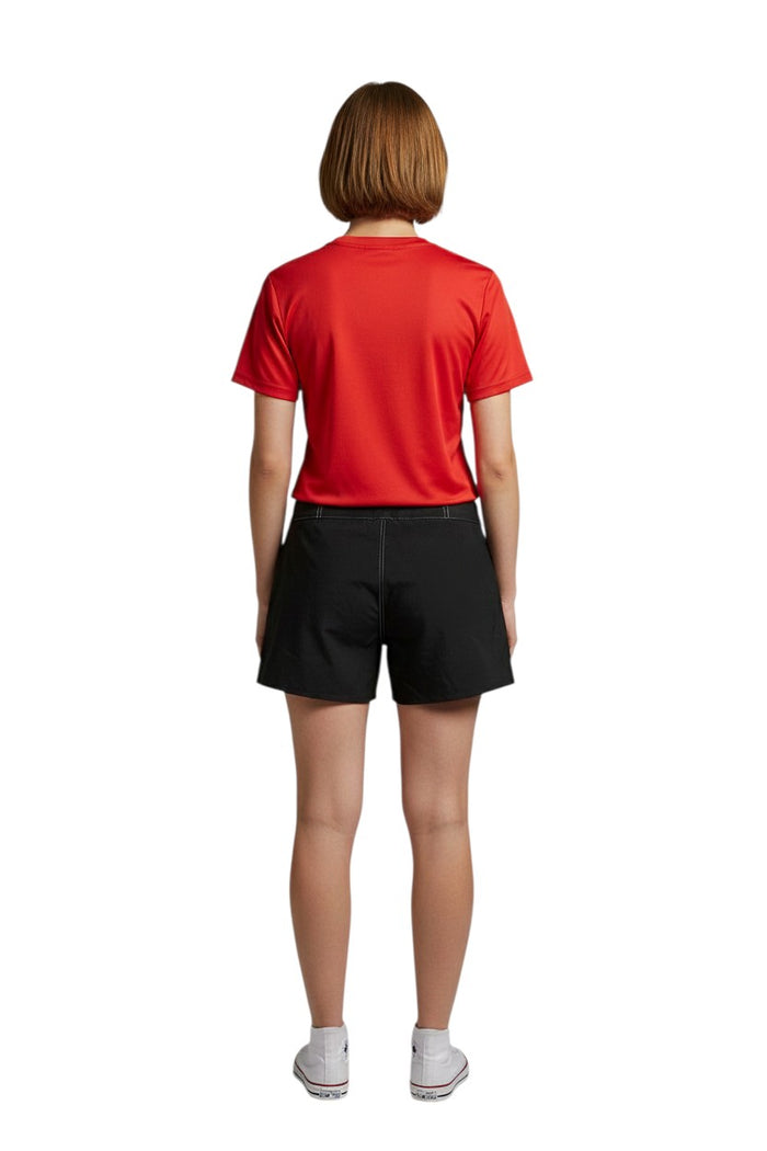 The Lifeguard Store black polyester-spandex board shorts with white contrast stitching and a drawstring waist.