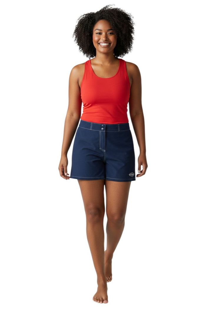 The Lifeguard Store navy blue polyester-spandex Guard Flex shorts with white contrast stitching and Guard logo.