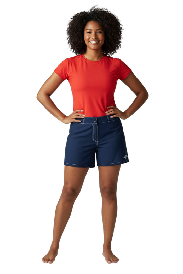 The Lifeguard Store navy blue polyester-spandex Guard Flex shorts with white contrast stitching and Guard logo.