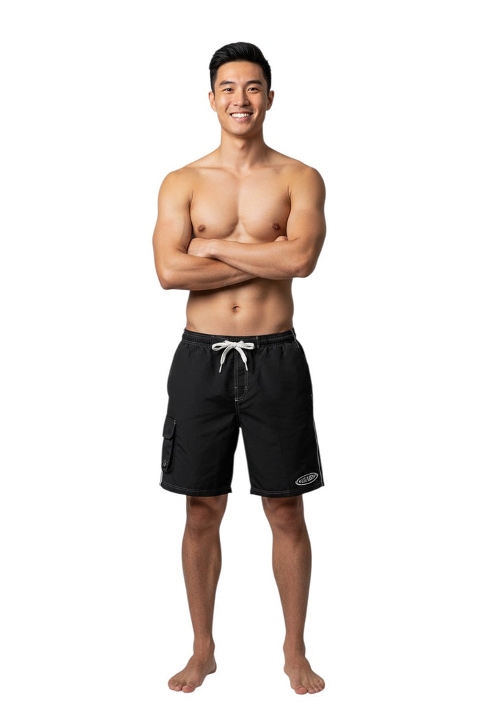 The Lifeguard Store black polyester-spandex boardshorts with white drawstring, contrast stitching, and GUARD logo.