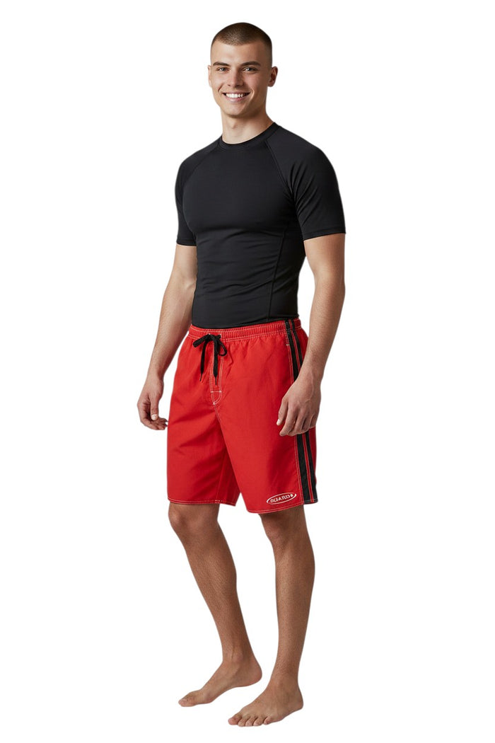 The Lifeguard Store red polyester board shorts with black and white side stripe and GUARD logo.