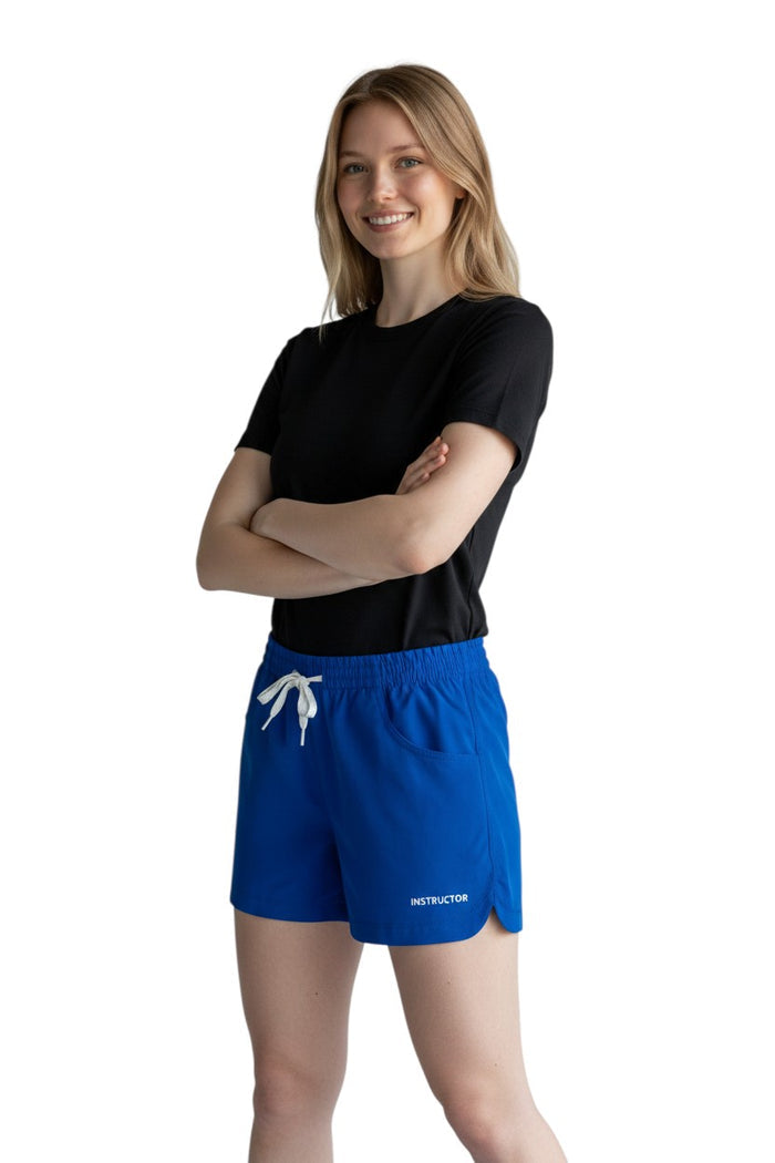 The Lifeguard Store royal blue polyester instructor shorts with elastic waistband, drawstring, and two pockets. UPF30+.