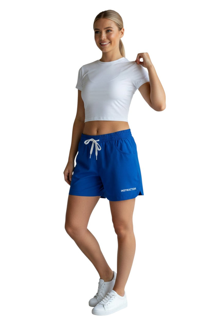 The Lifeguard Store royal blue polyester instructor shorts with elastic waistband, drawstring, and two pockets. UPF30+.