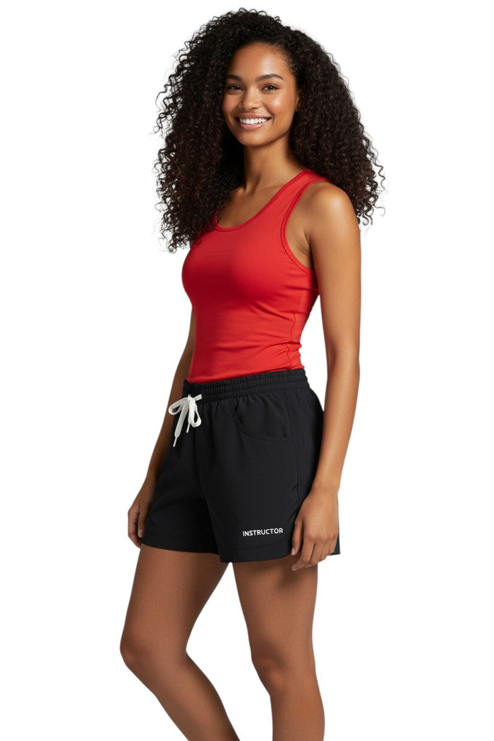 The Lifeguard Store black polyester instructor shorts with elastic waistband, drawstring, and two front pockets. UPF30+.