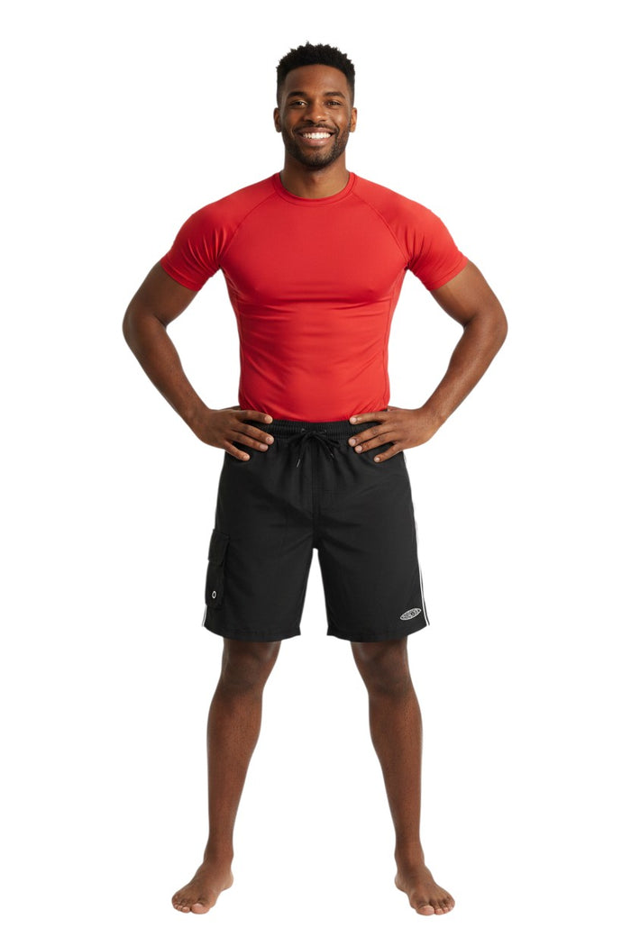The Lifeguard Store black polyester board shorts with elastic waistband, drawstring, cargo pocket, and instructor logo.