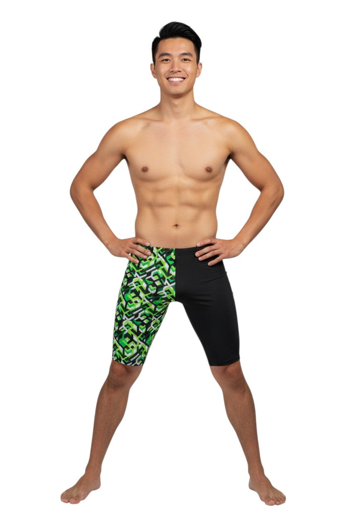 The Lifeguard Store RISE Sandies Breakout Poly Jammer swimsuit with green geometric pattern and black panels. Made of polyester/spandex blend.