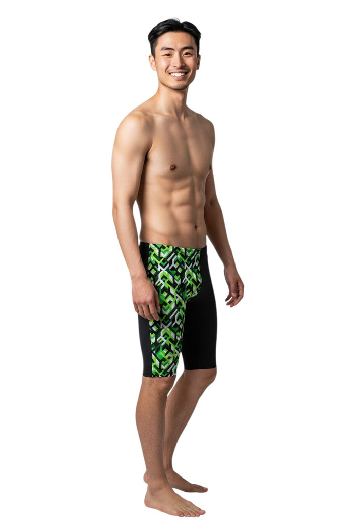 The Lifeguard Store RISE Sandies Breakout Poly Jammer swimsuit in black with green geometric pattern. Polyester/Spandex blend.