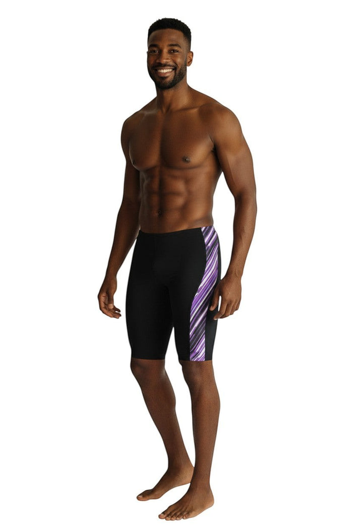 The Lifeguard Store RISE Sandies Laser Beam Poly Jammer swimsuit in black with purple striped side panel. Made of polyester and spandex blend.