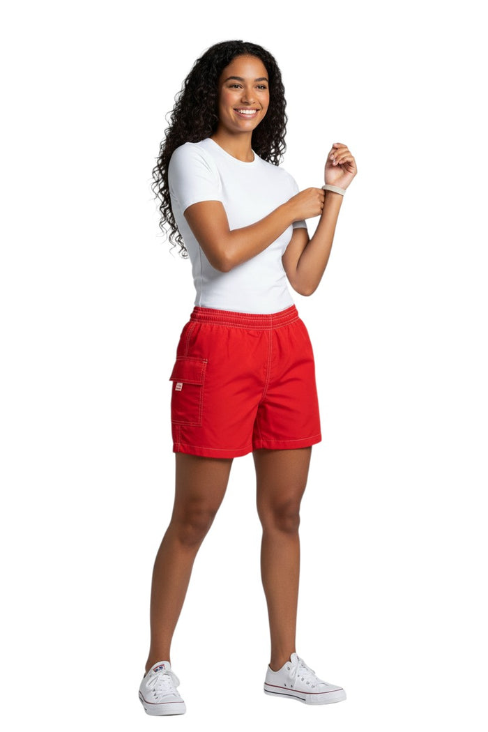 The Lifeguard Store RISE Solid Flex red polyester-spandex board shorts with side pocket and elastic waistband.