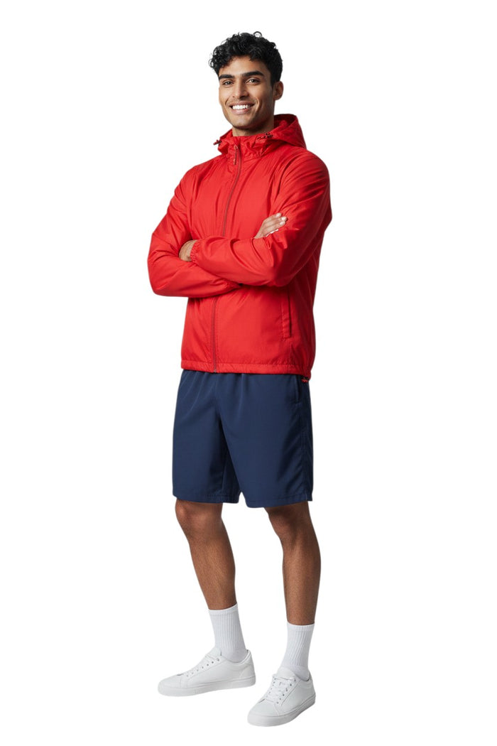 The Lifeguard Store RISE Solid Waterproof Jacket in red, made of lightweight polyurethane with heat-sealed seams and adjustable hood.