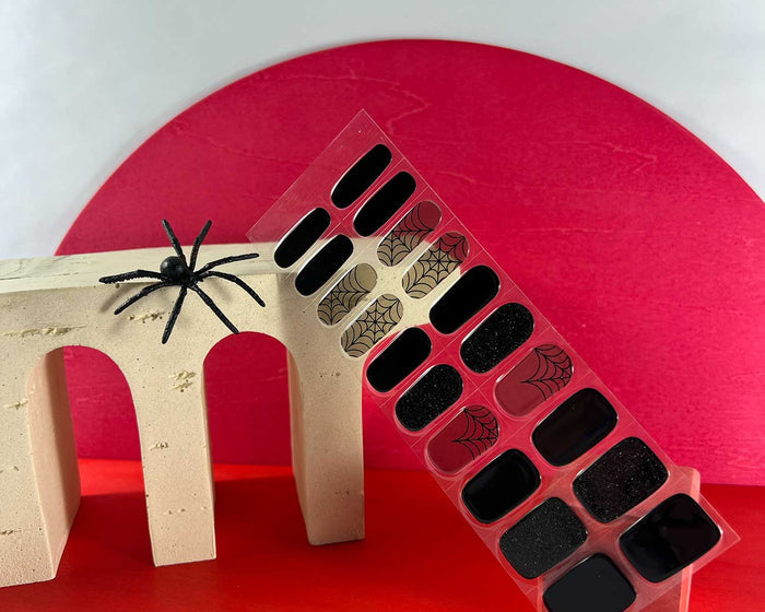 Black Widow gel nail wraps, Halloween-themed close-up