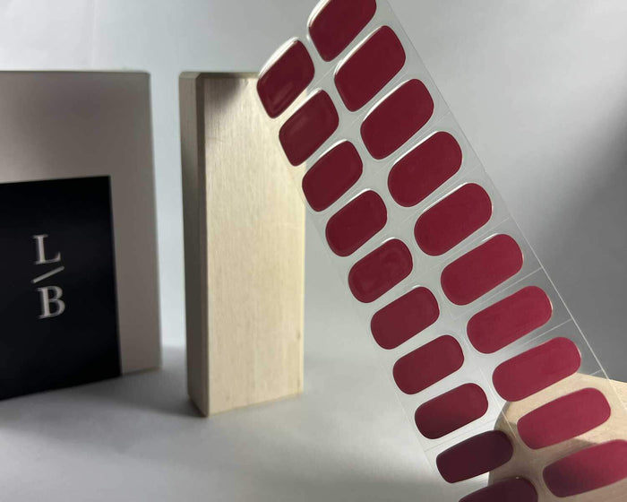 Mulberry semi-cured gel nail wraps on a nail mock-up