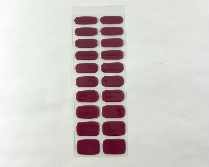 Mulberry gel nail wrap strip close-up