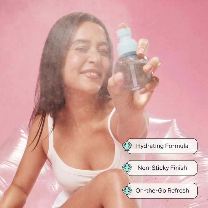 Woman holding up and spraying Sea Sweet hair and Body Mist with text on screen that reads "Hydrating Formula. Non-Sticky Finish. On-the-Go Refresh"