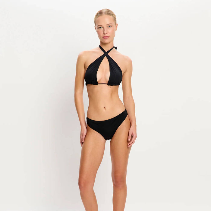 Front view of model wearing Modibodi Swimwear Bikini Brief in black with light to moderate absorbency, period swimwear made with sustainable materials.