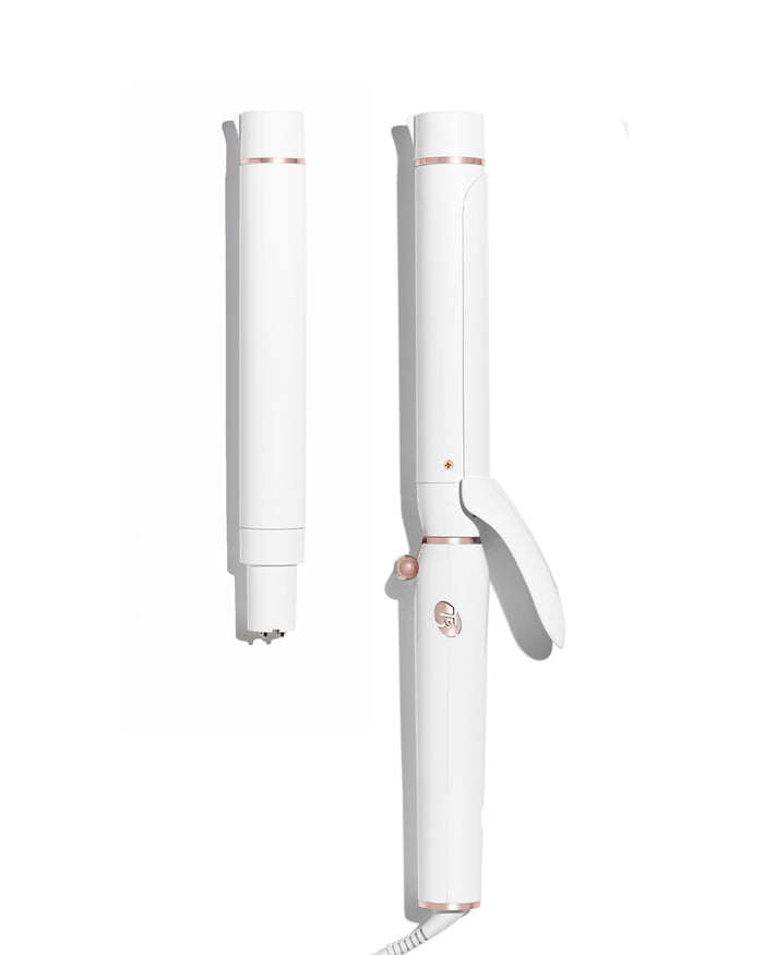 White and rose gold hair straightener on a white background