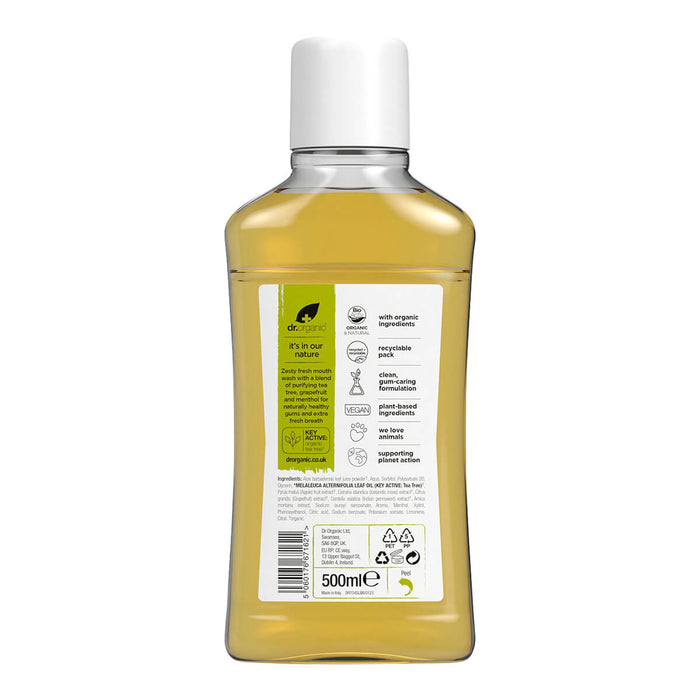 Back of 500ml bottle Dr. Organic Tea Tree Mouthwash with arnica, aloe vera, and grapefruit seed extract to purify and refresh the mouth.