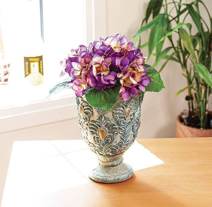 turquoise and gold planter,
stone pedestal plant pot,
elevated ceramic planter,
decorative raised stoneware planter,
bold colorful plant holder,